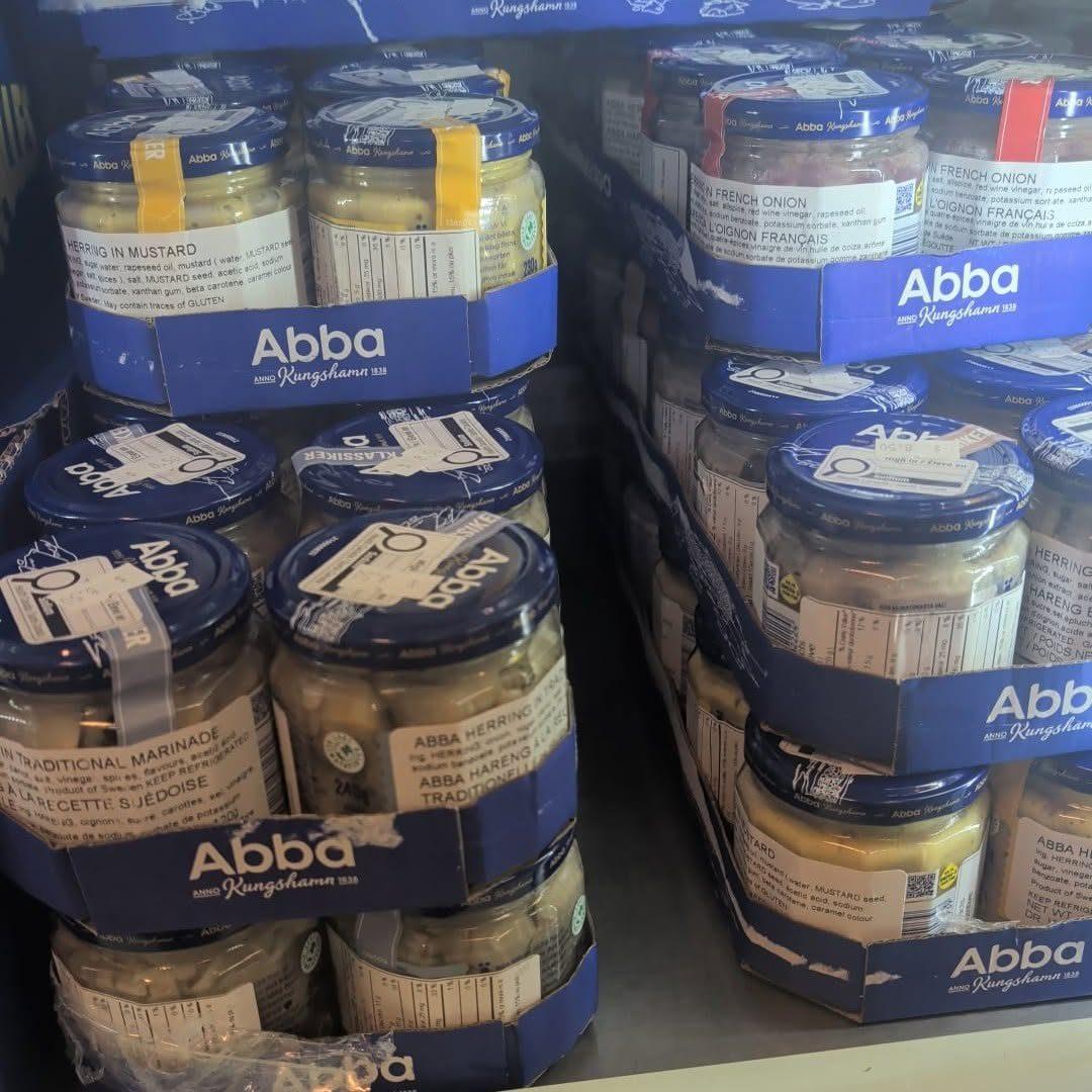 Tins of Abba fiskbullar and Swedish herring on the shelf at Hansel Deli, Cloverdale Surrey