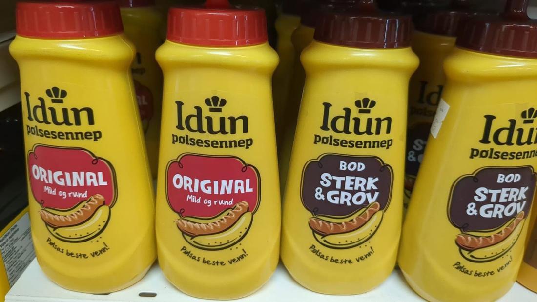 Bottles of Idun pølsesennep Norwegian hot dog mustard at Hansel Deli in Surrey BC