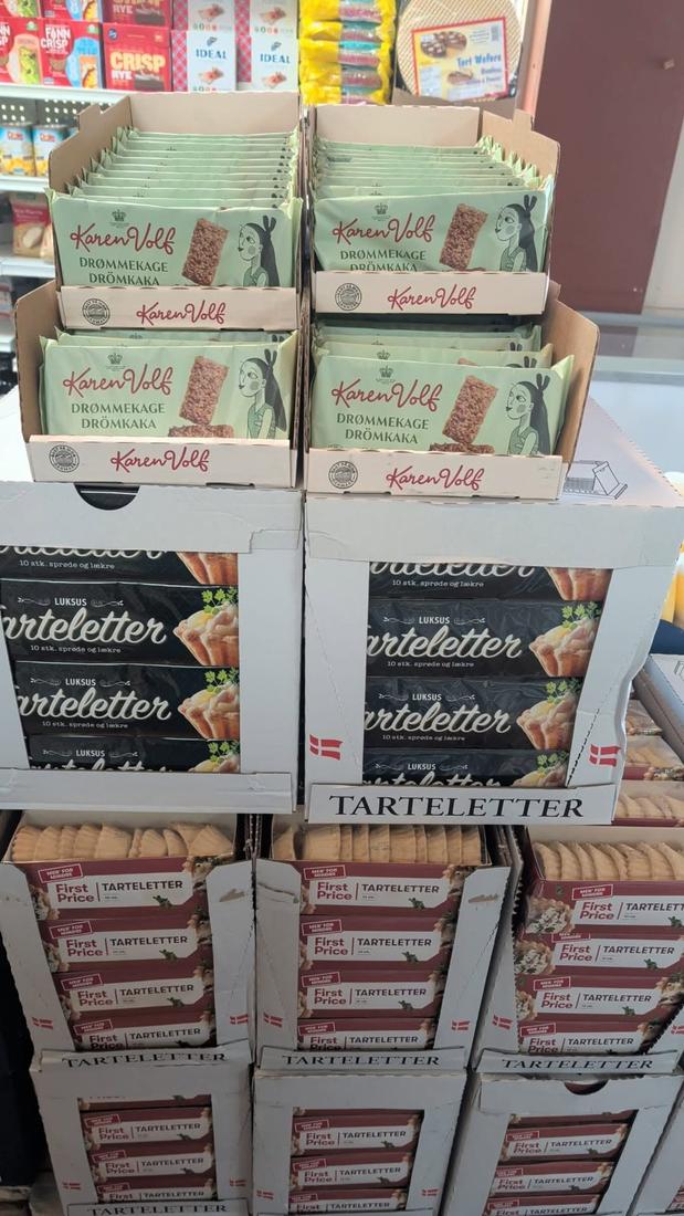 Karen Volf dr&oslash;mmekage and boxes of tarteletter at Hansel Deli in Surrey BC
