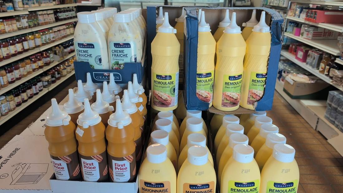 Bottles of Graasten and K-Salat Danish remoulade and mayonnaise on the shelf at Hansel Deli