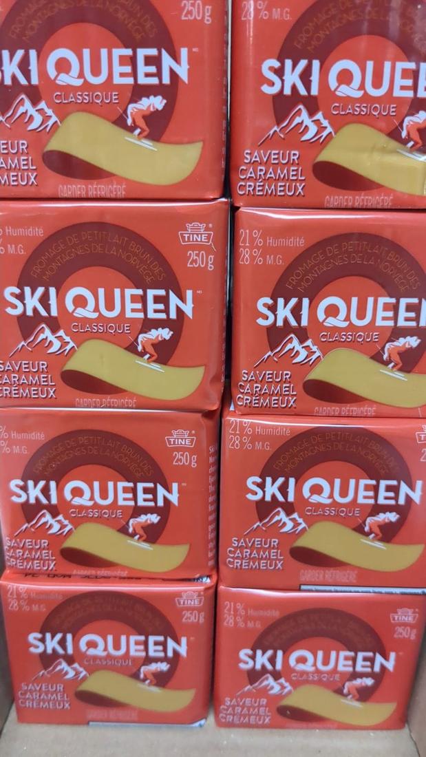 Cases of Ski Queen gjetost Norwegian brown cheese stacked at Hansel Deli in Surrey BC